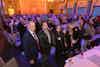 a group of people standing in a room