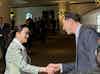 a man and woman shaking hands