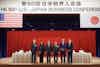 a group of people standing on a stage